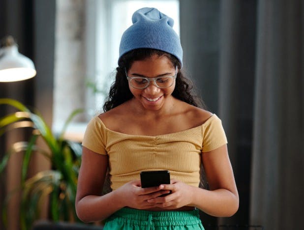 Smiling Teen on Phone