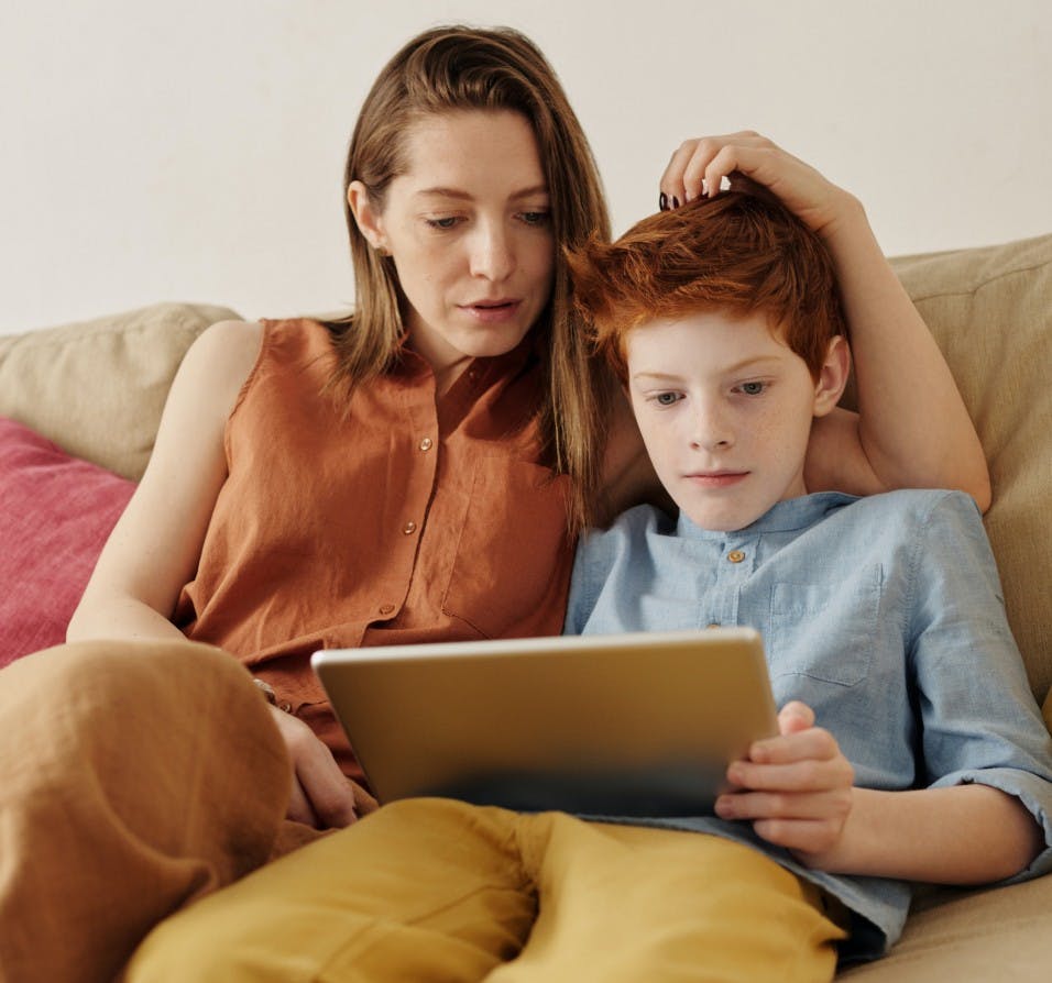 Mother and Son Using Tablet