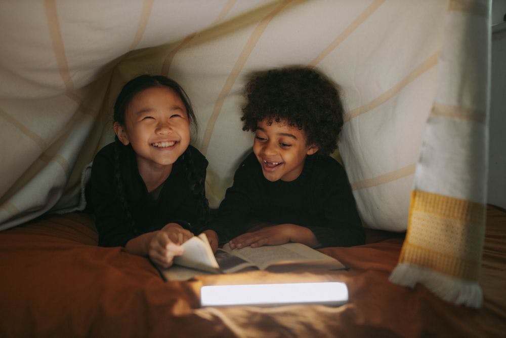 Kids reading in bed
